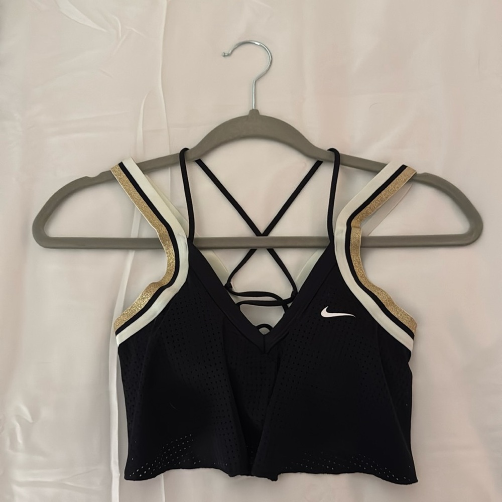 Nike sports bra, black, white, and gold
